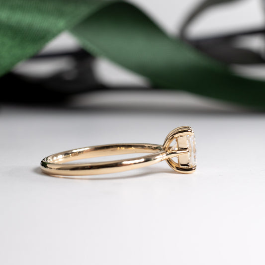 Moissanite Ring: 14K Yellow Gold Radiant Emerald Cut Solitaire