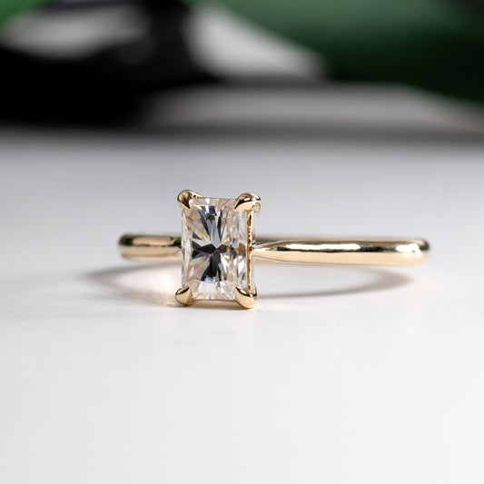 Forever One Moissanite Ring: 14K Yellow Gold Radiant Emerald Cut Solitaire