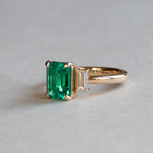 18K 1.4 CT Emerald Three Stone Ring