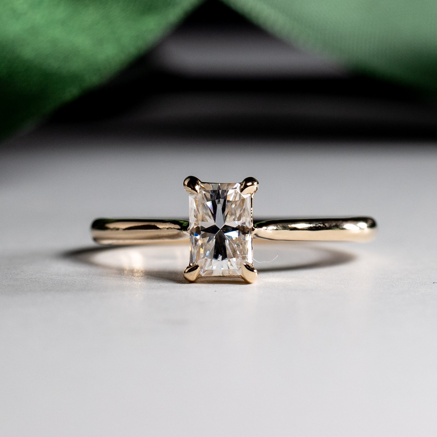 Forever One Moissanite Ring: 14K Yellow Gold Radiant Emerald Cut Solitaire