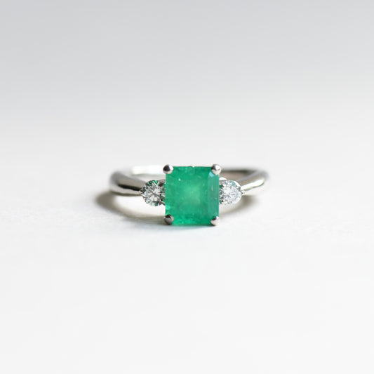 Platinum Emerald Diamond Ring: 1.23 Carat Three Stone Estate Ring