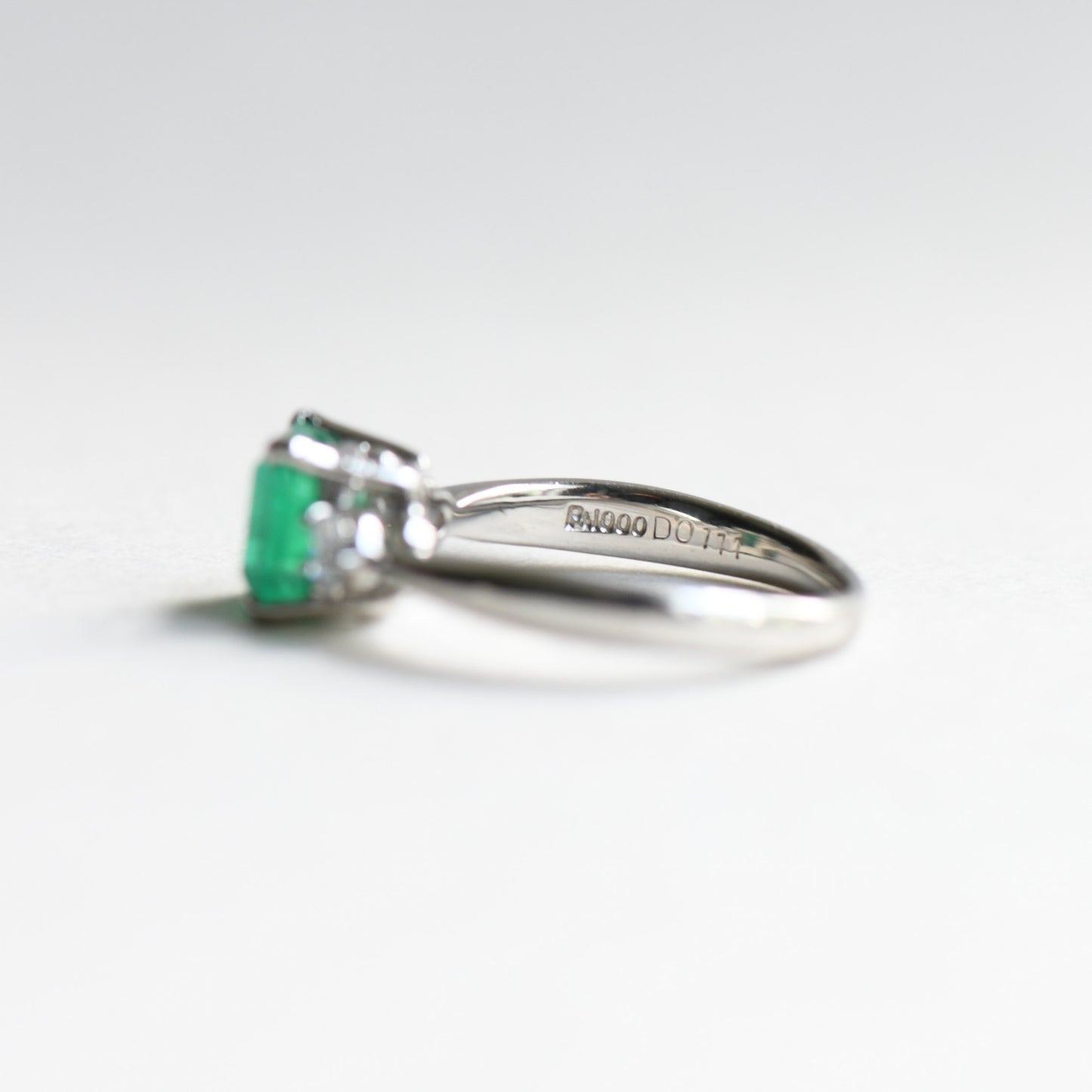 Platinum Emerald Diamond Ring: 1.23 Carat Three Stone Estate Ring