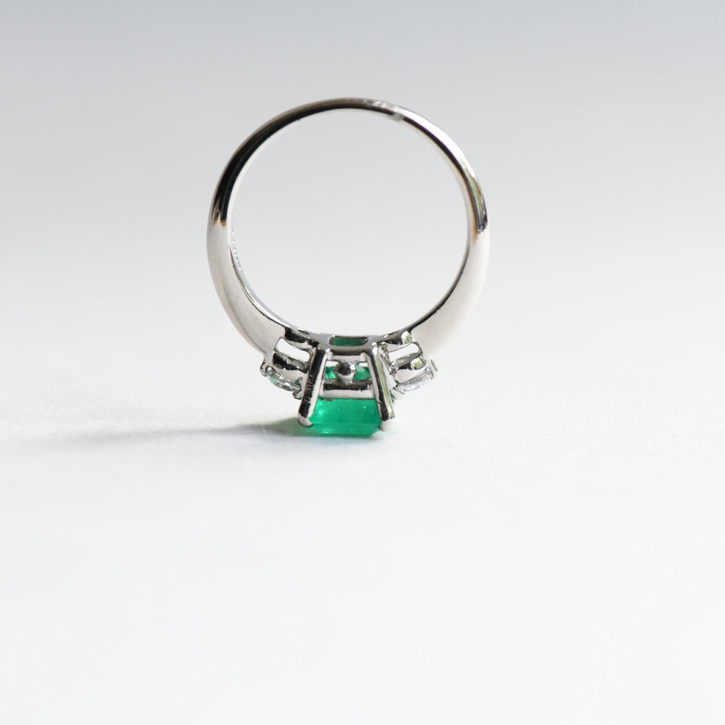 Platinum Emerald Diamond Ring: 1.23 Carat Three Stone Estate Ring