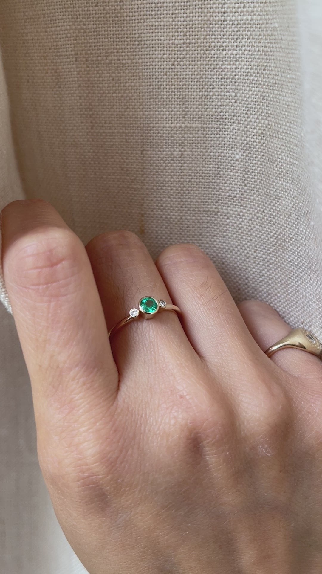 Round emerald engagement on sale rings